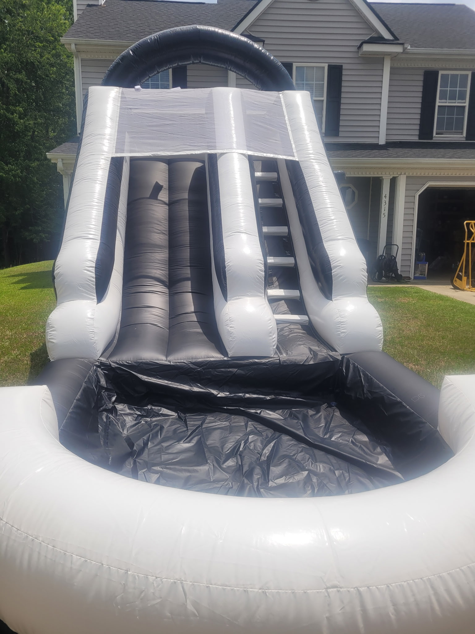 Water slide with splash pool